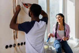 /assets/african-american-man-working-with-pliers-while-his-2023-11-27-05-07-03-utc-min.jpg